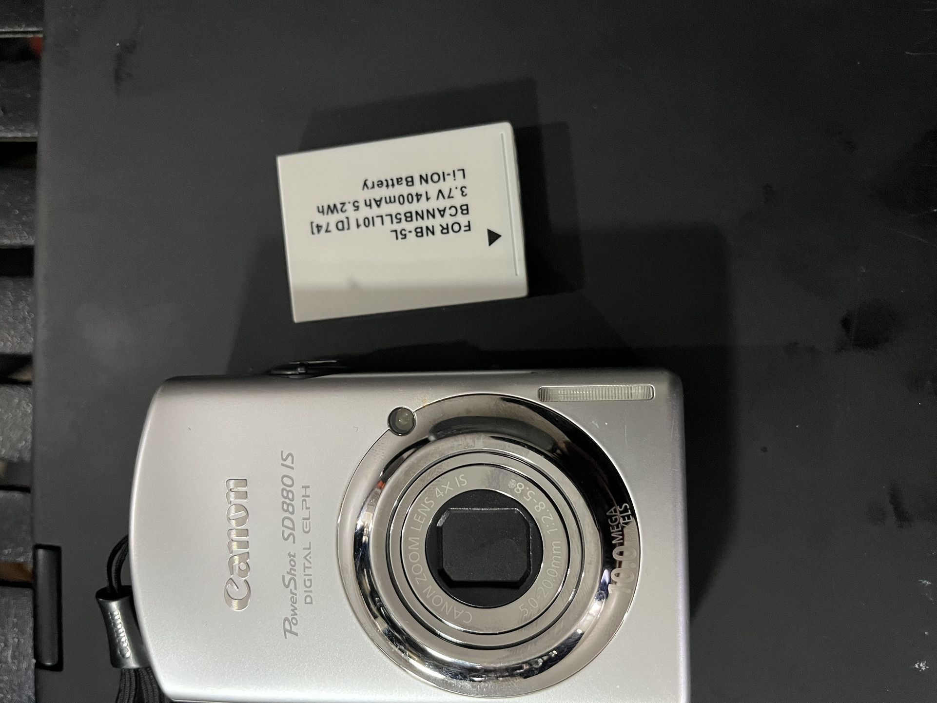 $100 Canon PowerShot SD880IS 10MP Digital Camera with 4x Wide Angle Optical Image Stabilized Zoom (Silver)