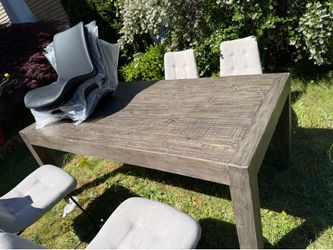 Solid wood dining table with four chairs and 6 chair tops