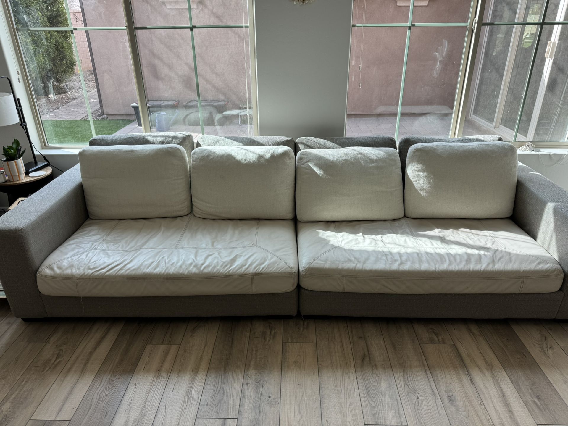 Large 11 Foot Modern Grey Couch with Cream Leather Cushions