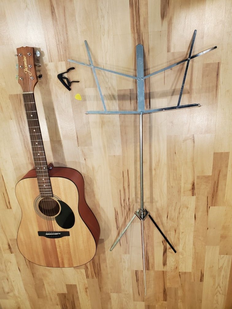 New Aucoustic Guitar With Music Stand Capo And Pick