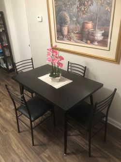 Black kitchen dining table set with 4 leather chairs