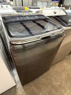 Black Samsung XL Capacity Washing Machine with Washboard