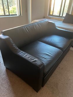 Black Reclining Sofa Bed – Includes Pillows