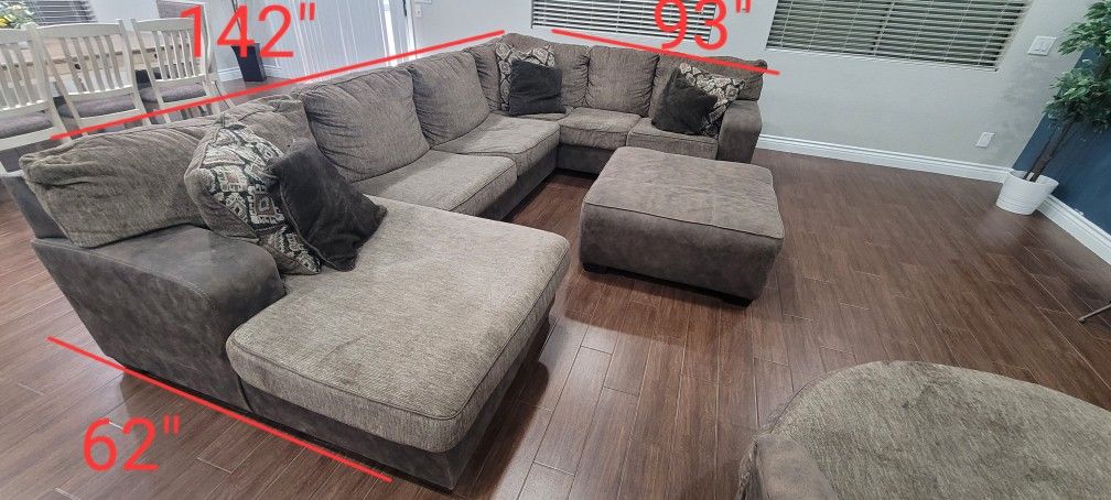 Huge Sectional With Ottoman And Swivel Chair
