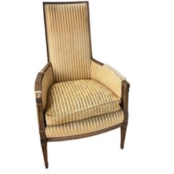 Yellow Vintage Louis XVI style fauteuil with a wood frame 