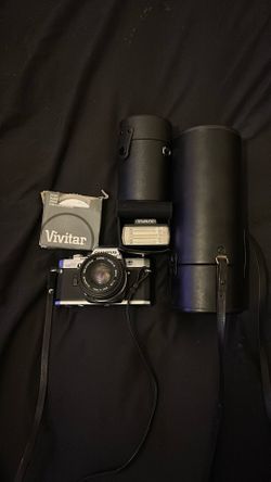 Olympus OM-10 35mm Camera With Lenses