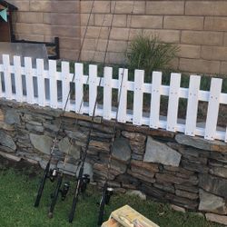 Four (4) Fishing Rods with Shimano & Mitchell Garcia Reels Plus a Tackle Box Loaded With Lures,Hooks and more.