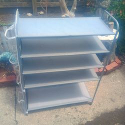 Rack For Shoes 5 Shelves And On The Side It Can Hold 4 Per Of Shoes On The Bottom It Can Hold Boots 