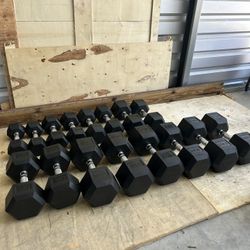 New pair of 10,15,20,25,30,45,50 and 55lb rubber dumbbells NEW IN BOX $500