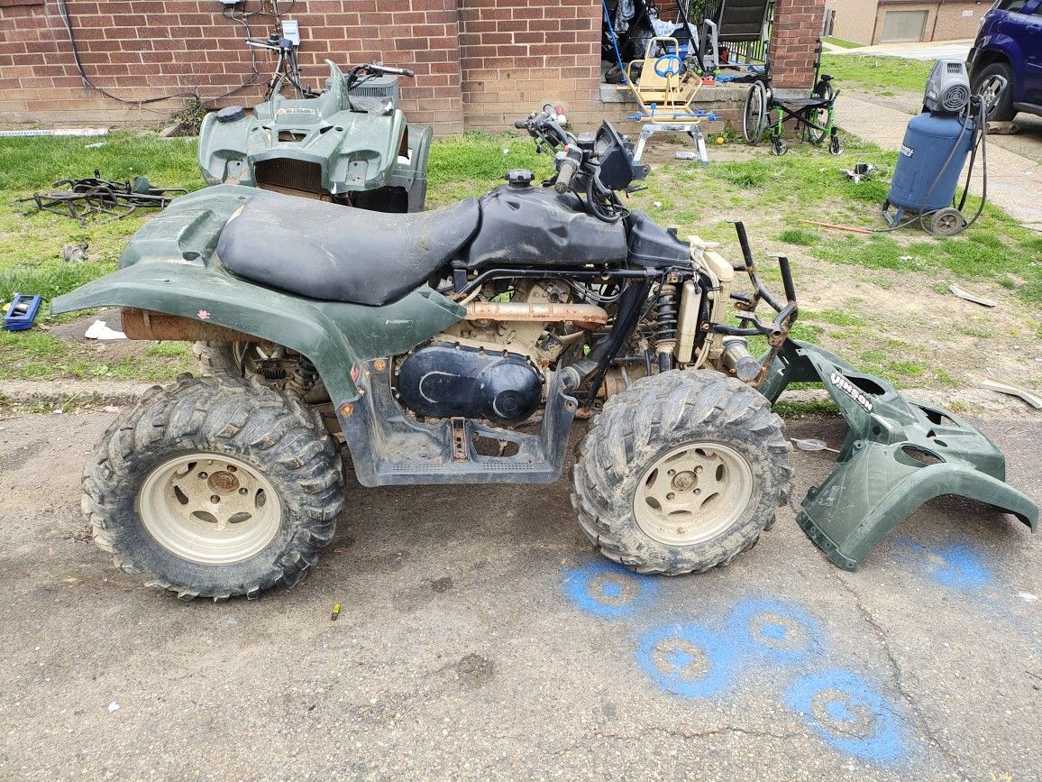 Two Suzuki 4x4 500