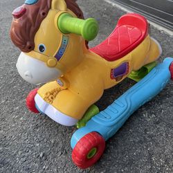 Fisher-Price laugh and learn strive to ride pony