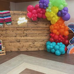 Wooden Backdrop And Balloon Decorations 