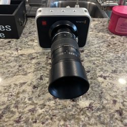 Blackmagic Cinema Camera 4k with a Tamron lens attached. 