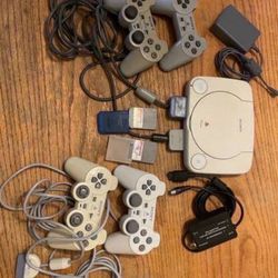 Sony PlayStation One Slim Gaming System, 4 Controllers, 1 Game & All Power Cords Bundle