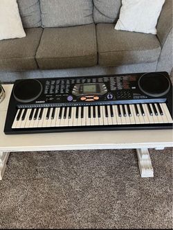 Casio, Portable 61 key Electric Keyboard