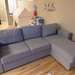 Modern IKEA sectional sofa bed in excellent condition.