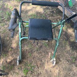 Four wheel rollarter walker