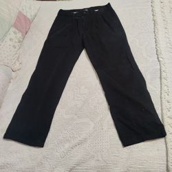 BLACK PLEATED FRONT W/POCKETS ,2 BACK POCKETS  34 X 32 BY GEORGE