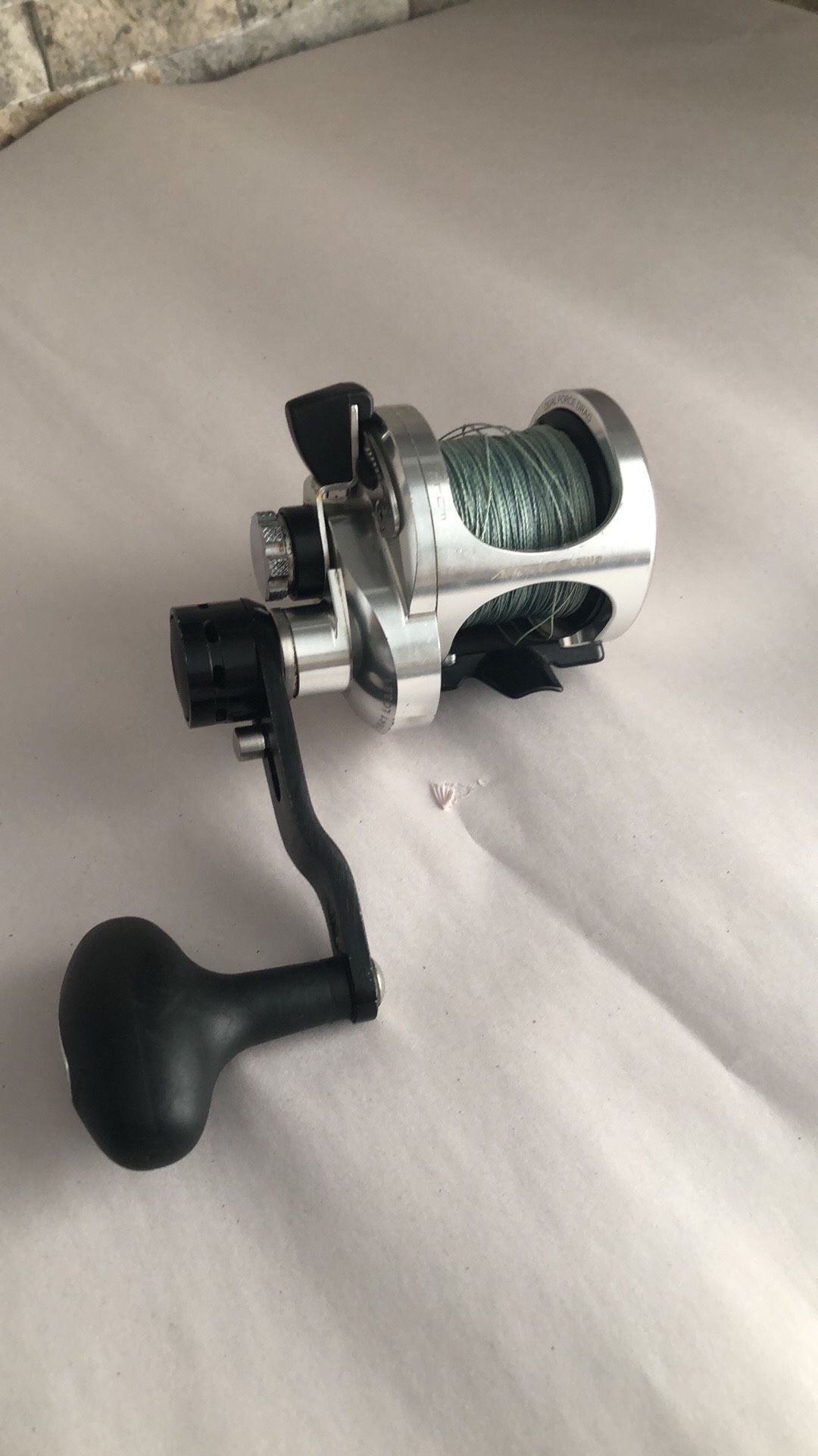 Okuma ANDROS 511A TWO SPEED BIG GAME Fishing Reel loaded with 65lb Braid Line.