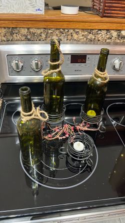Tea, light wine, bottle, holders, candles