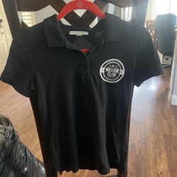 Black Washoe Club polo shirt with white circular logo