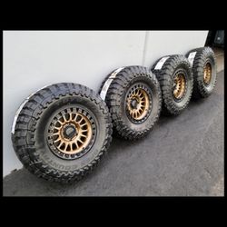 17" KM552  IMS bronze gold black lip w- 35" Toyo MT Open Country Tires 