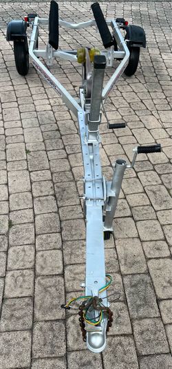 Aluminum Jet ski trailer. Registration. New lights, new wires. Ready to load….