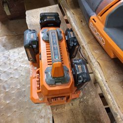 Charger. 4 Batteries. & Vacuum 
