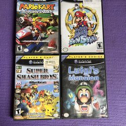 Mario Kart double Dash, Super Mario Sunshine , Super Smash Bros , Luigi Mansion 