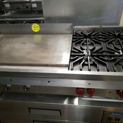 Used Wolf 60"L Counter Top With 36"L Thermo Griddle, 4 Burners, And Natural Gas 
