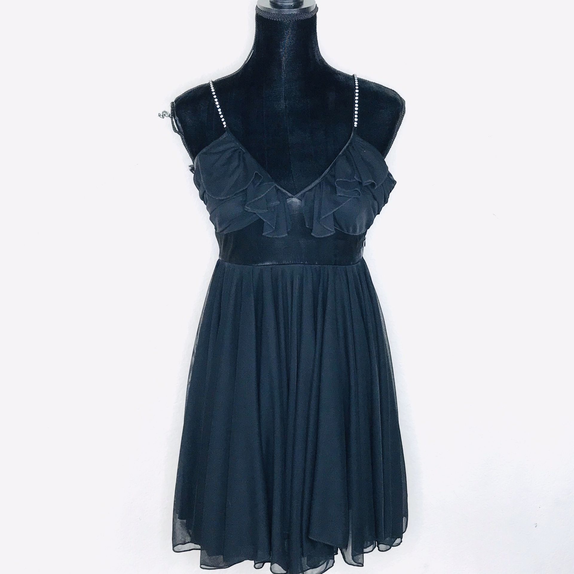 B. Smart black babydoll dress size 7/8 Juniors