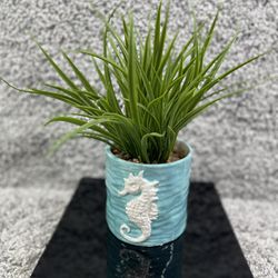 Green Artificial Grass Plant With Carved Sea Horse In Pot