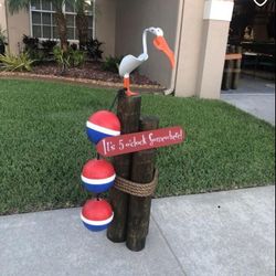 Nautical decoration pillar with bird sign and buoy great for poolside tiki hut bar patio made of Presure treated wood and stained