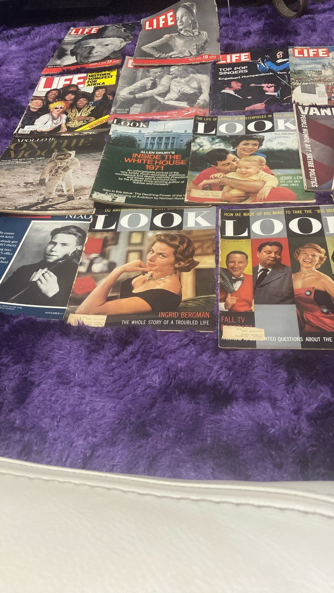 A collection of old magazine, Life, and look all the way back to Apollo the Disney open in Nixon childhood