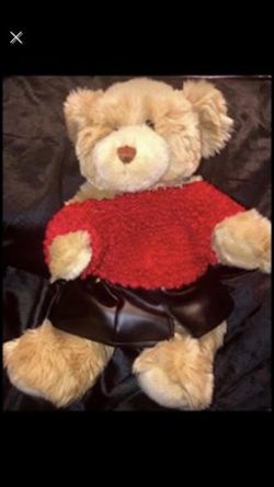 Build-a-bear light brown bear wearing a red blouse & black skirt. In great condition.