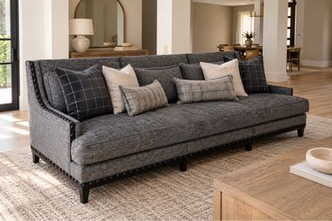 Large Gray Upholstered Sofa with Nailhead Trim
