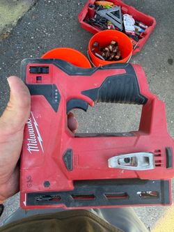 That’s a Milwaukee M12 3/8” Crown Stapler