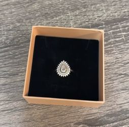 Pear shaped diamond halo ring