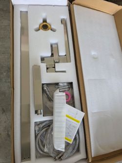 Faucet tub filler