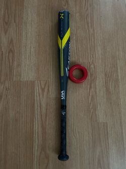 Baseball bat and weighted ring