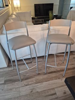 Bar or high kitchen counter stools.