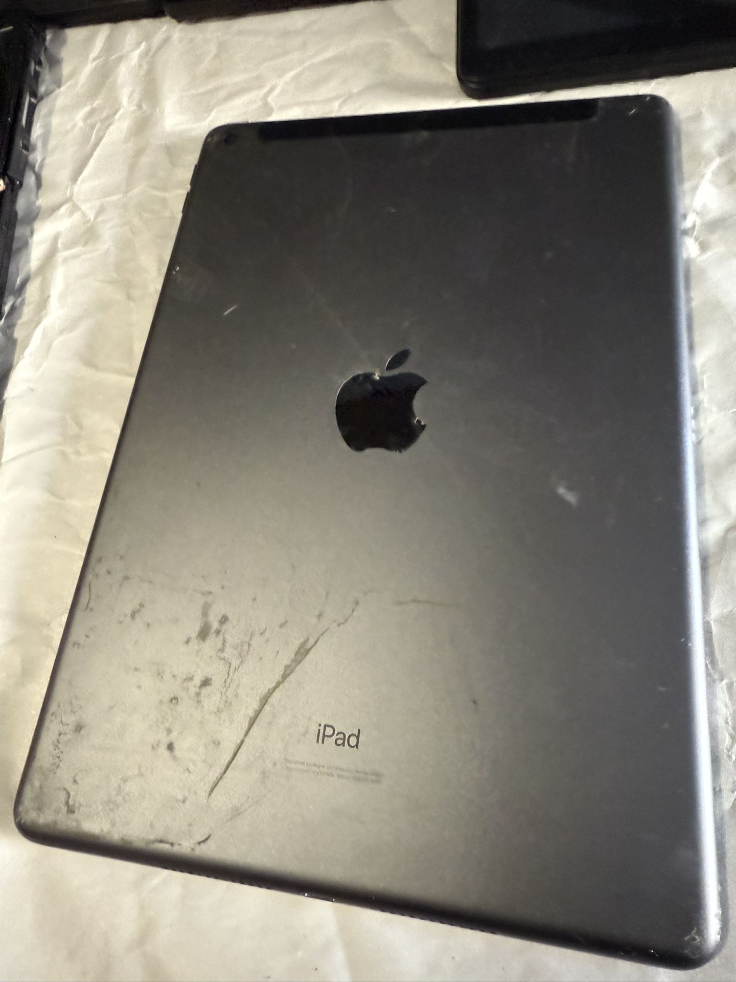 Apple iPad , iPhone And Assorted Tablets For Sale. Please see pics for further details. Mostly for parts. Though I believe most of them are in workin