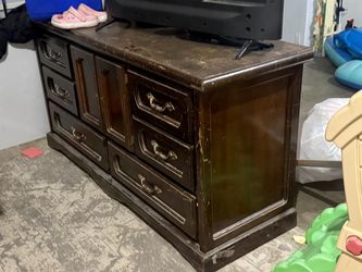 Dark Wood Dresser with Multiple Drawers