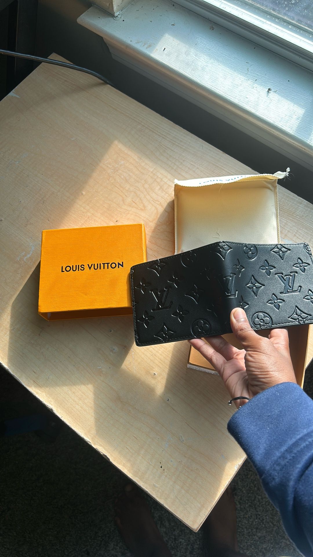 Louis Vuitton wallet (opened box) good condition