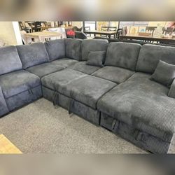 Black corduroy sectional pullout sleeper bed