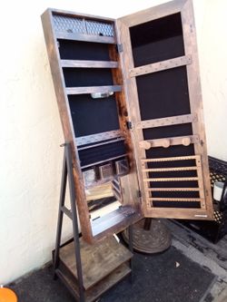 mirror with closet inside.