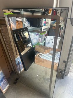 Brand new rectangular wall-mounted-mirror height 47, width 24 inches
