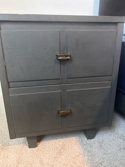 Dark Gray Wood Cabinet with Brass Handles