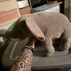 Large Elephant And Red Panda Stuffed Animals