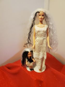 One of a kind Barbie pair